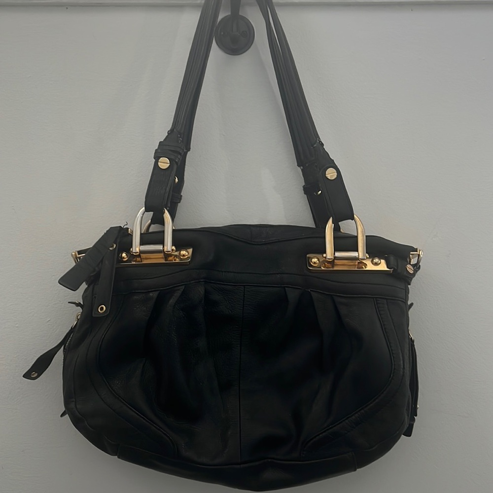 B. Makowsky leather pocketbook. Gold hardware Zipper closure inside pockets.